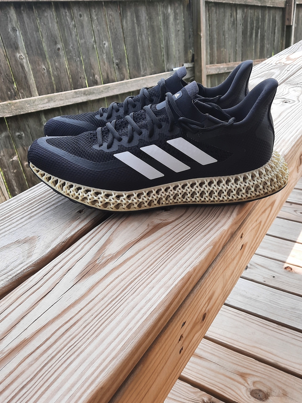 adidas Men’s Black Athletic Shoes with White Stripes and Cream 4D Midsole
